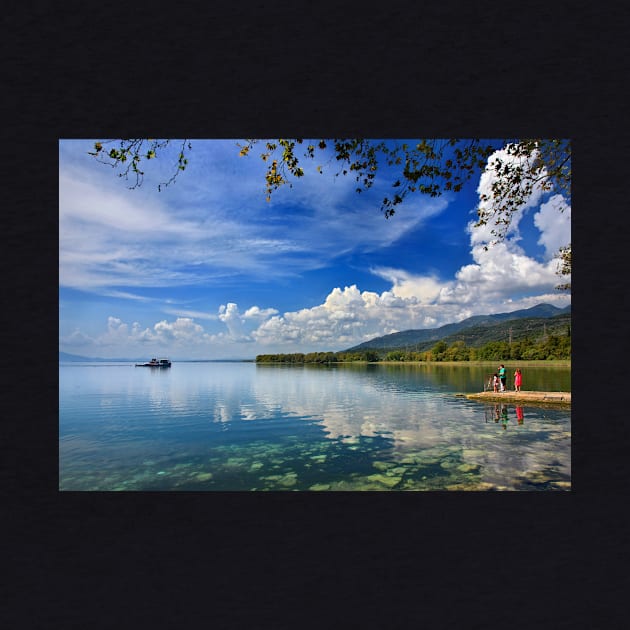 Waiting for the fishing boat at Trichonis lake by Cretense72